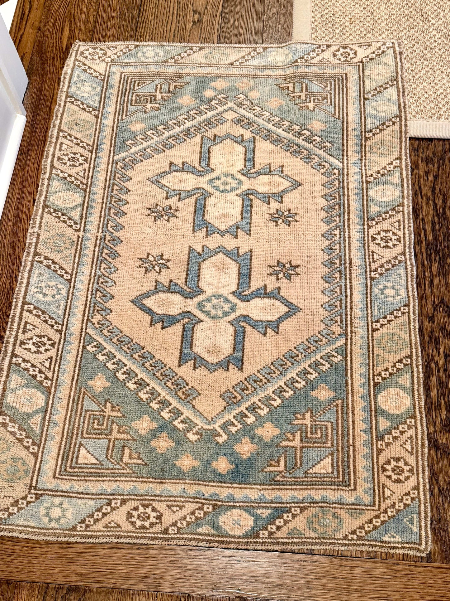 2’7”x3’8” Vintage Oushak Area Rug in teal, blue, tan, and cream colors