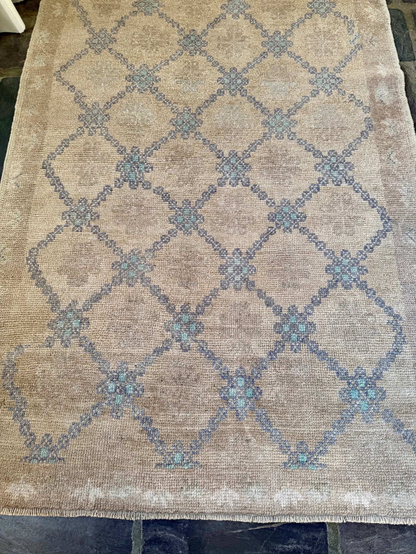 3’3”x5’2” vintage Turkish area rug with beige, brown, and blue design perfect for layering