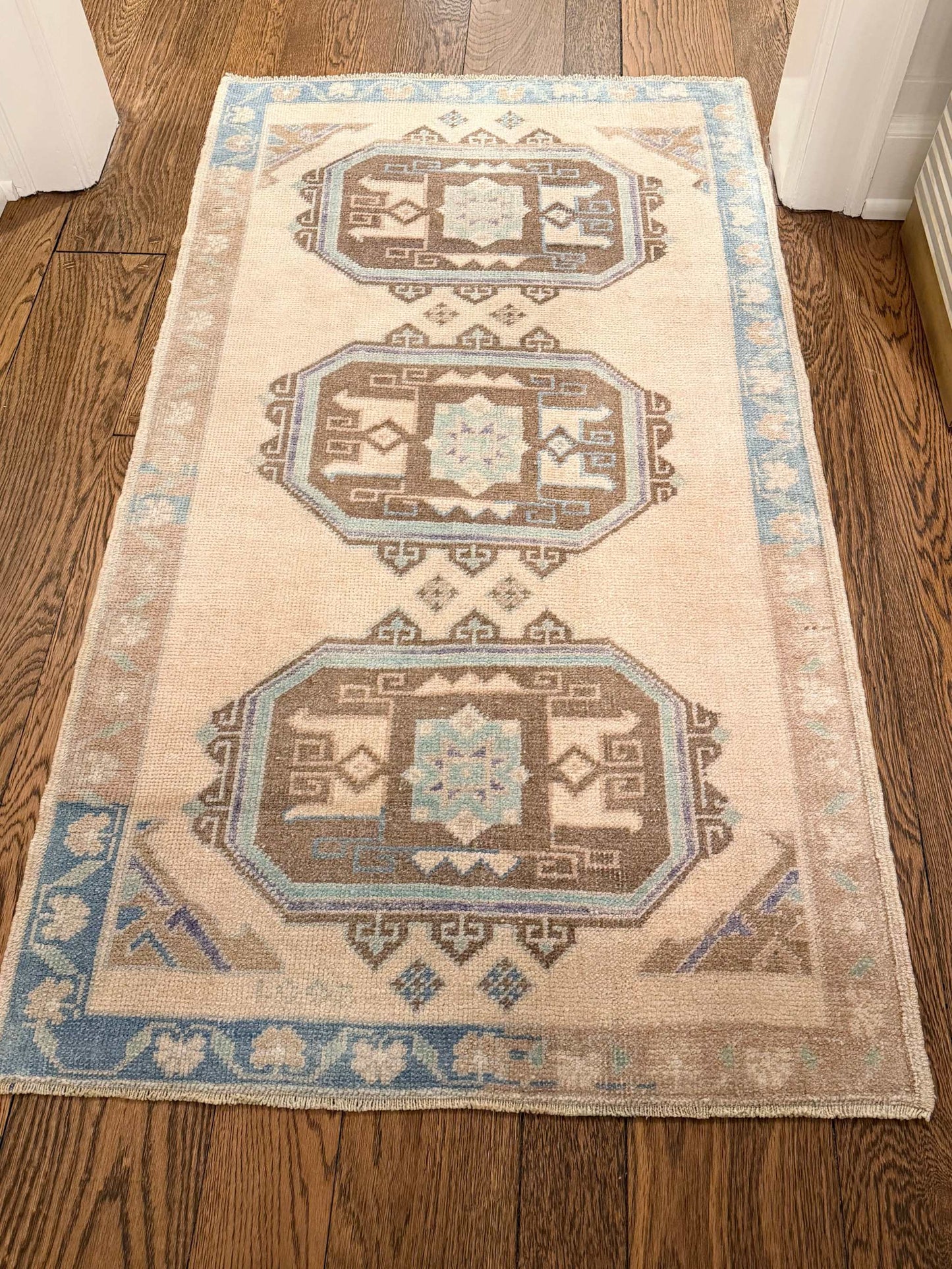3’2”x5’8” Vintage Turkish area rug with beige, brown, and blue patterns
