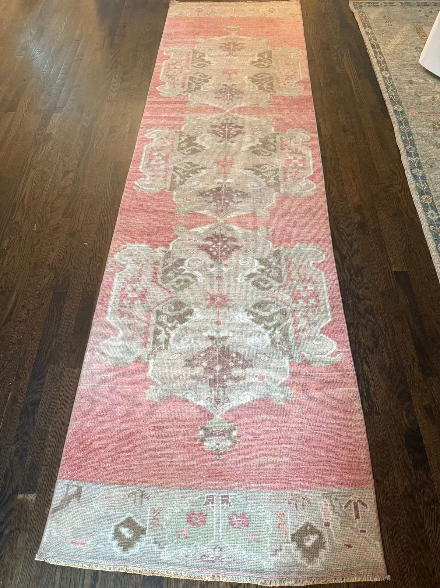 3’2” x 11’7” vintage runner rug with salmon, gray, green, plum, and ivory colors