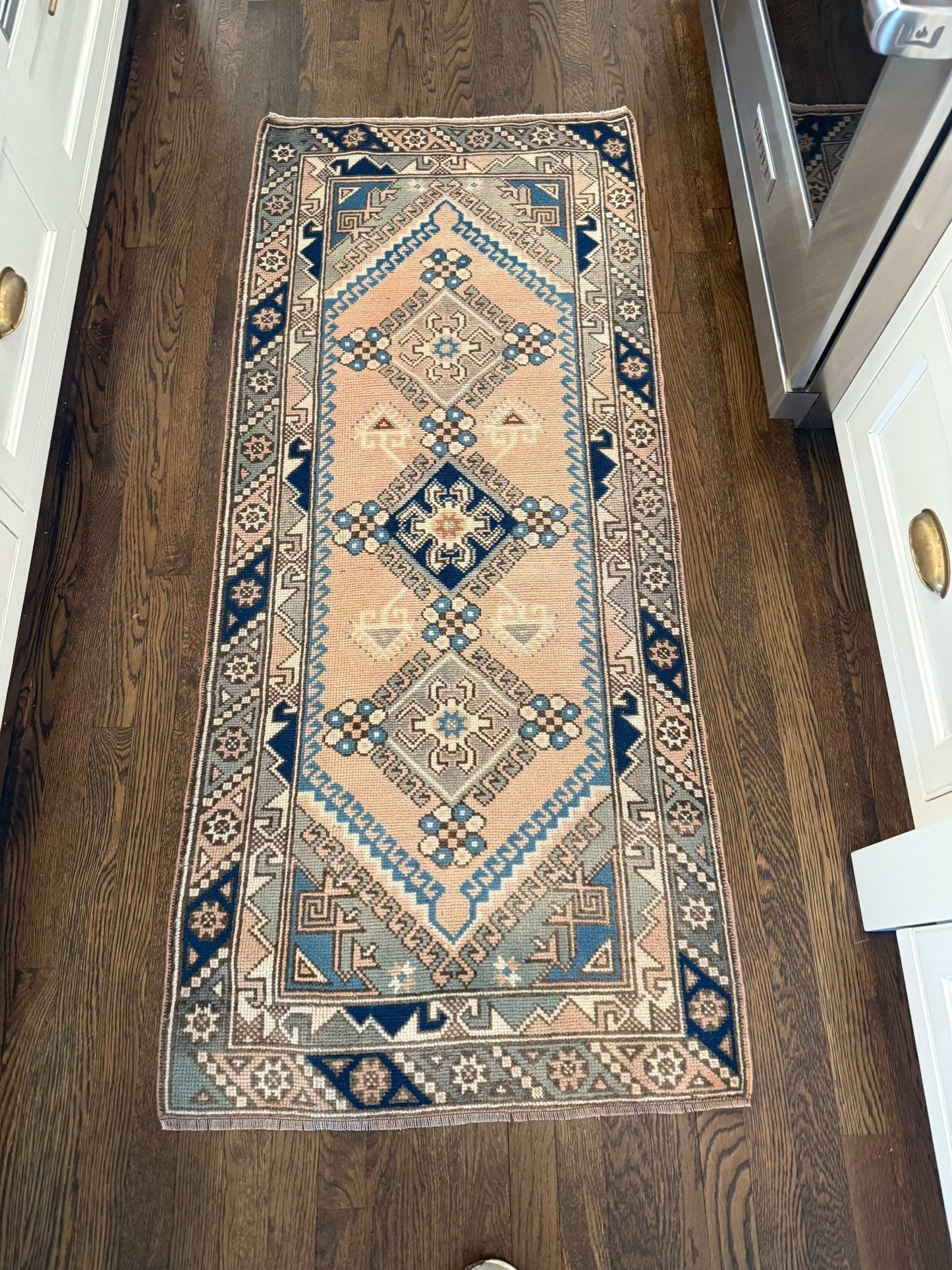 2’5” x 5’7” runner with stunning blue design