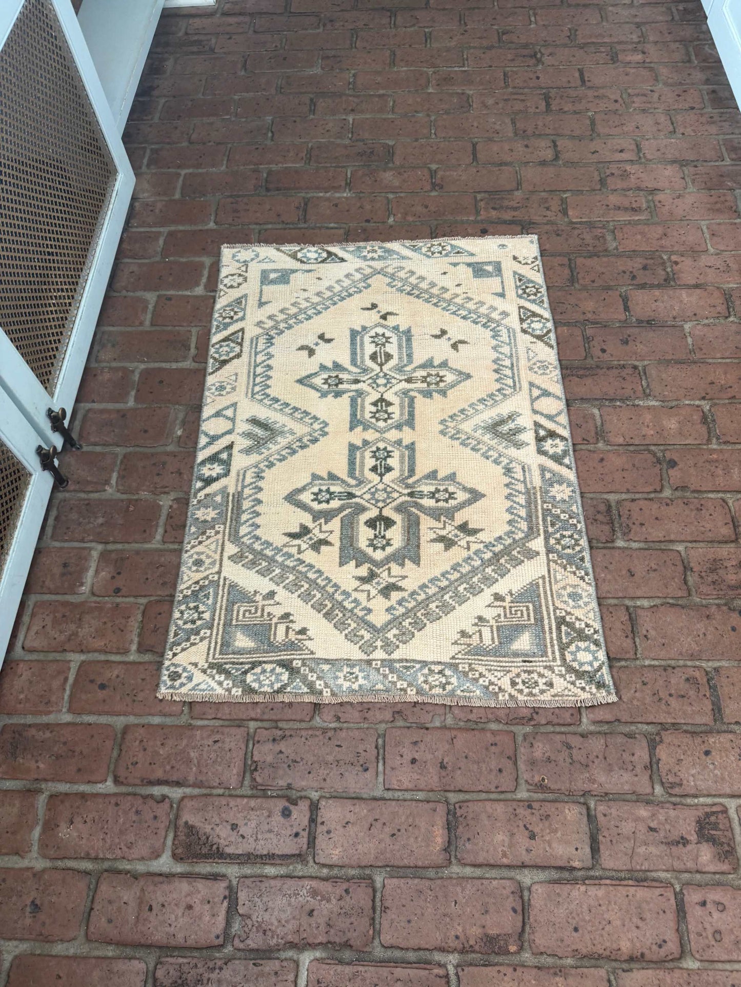 2'4" x 3'5" hand-knotted area rug with double cross design in blue, gray, and beige tones