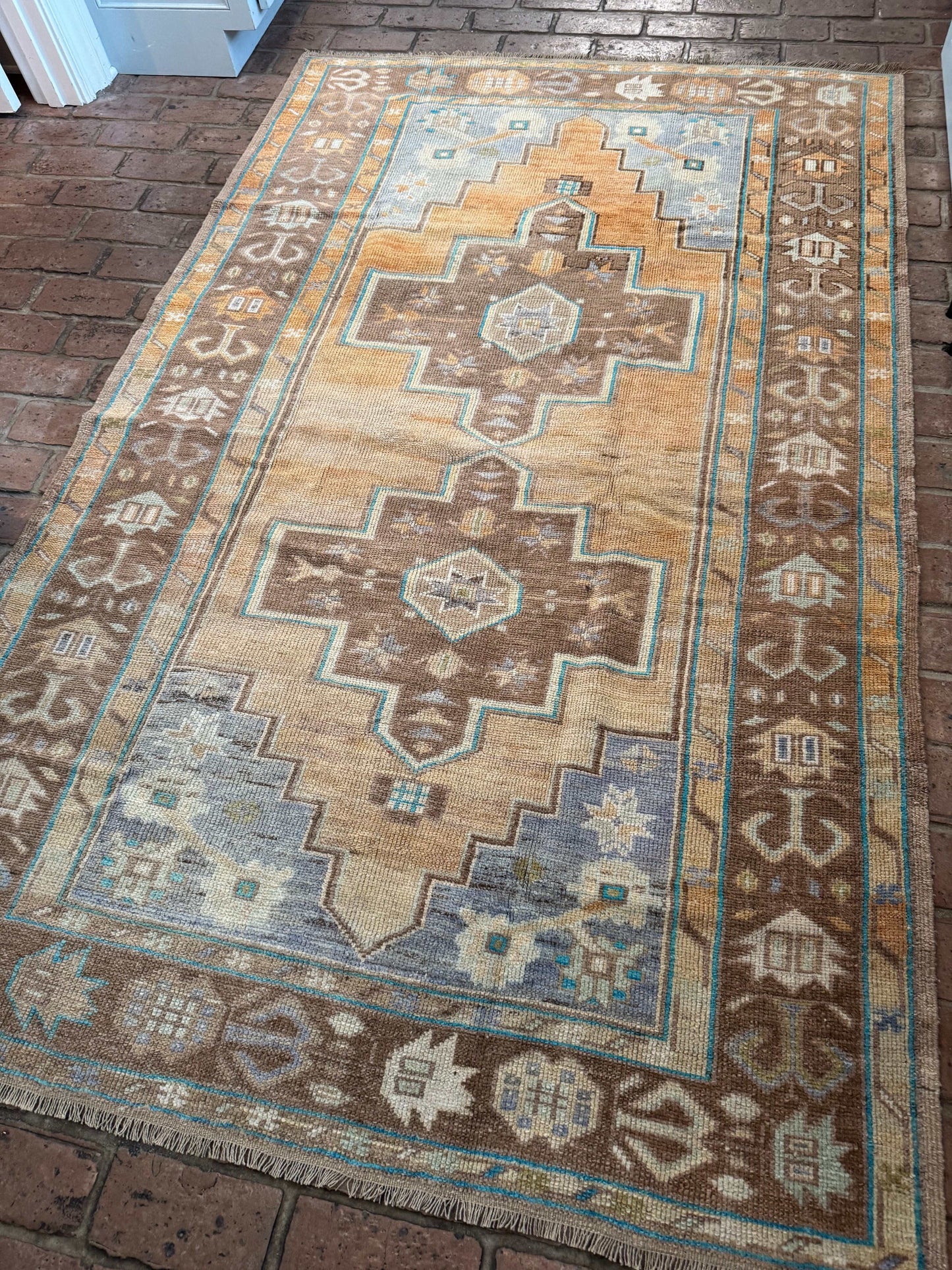 4'4" x 7'1" Area Rug with Orange and Brown