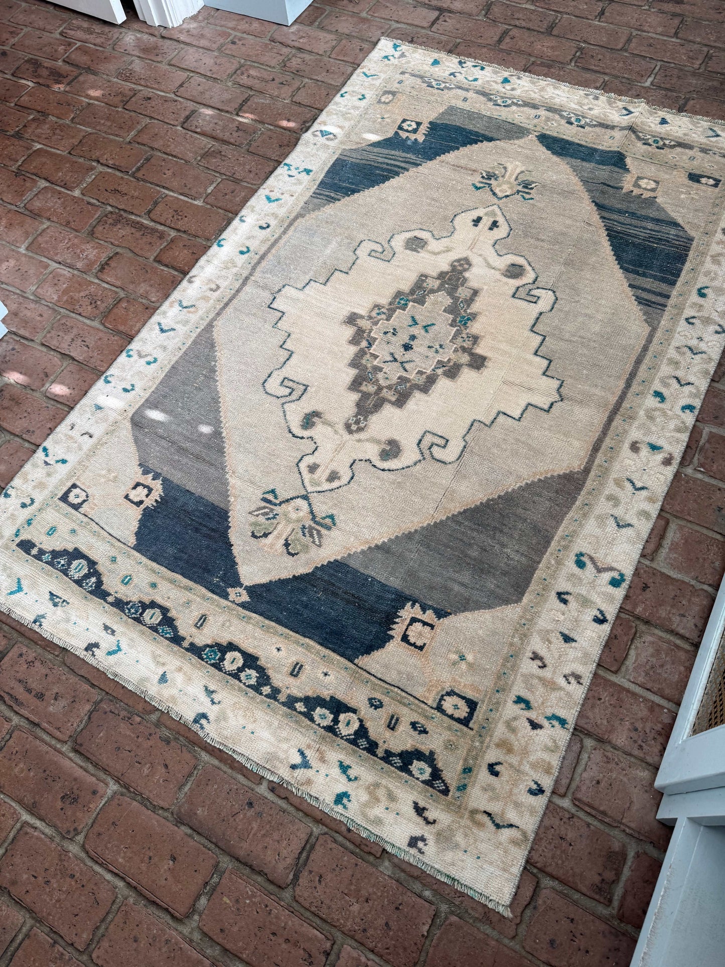 3'8" x 5'9" area rug in gray and slate blue pattern.
