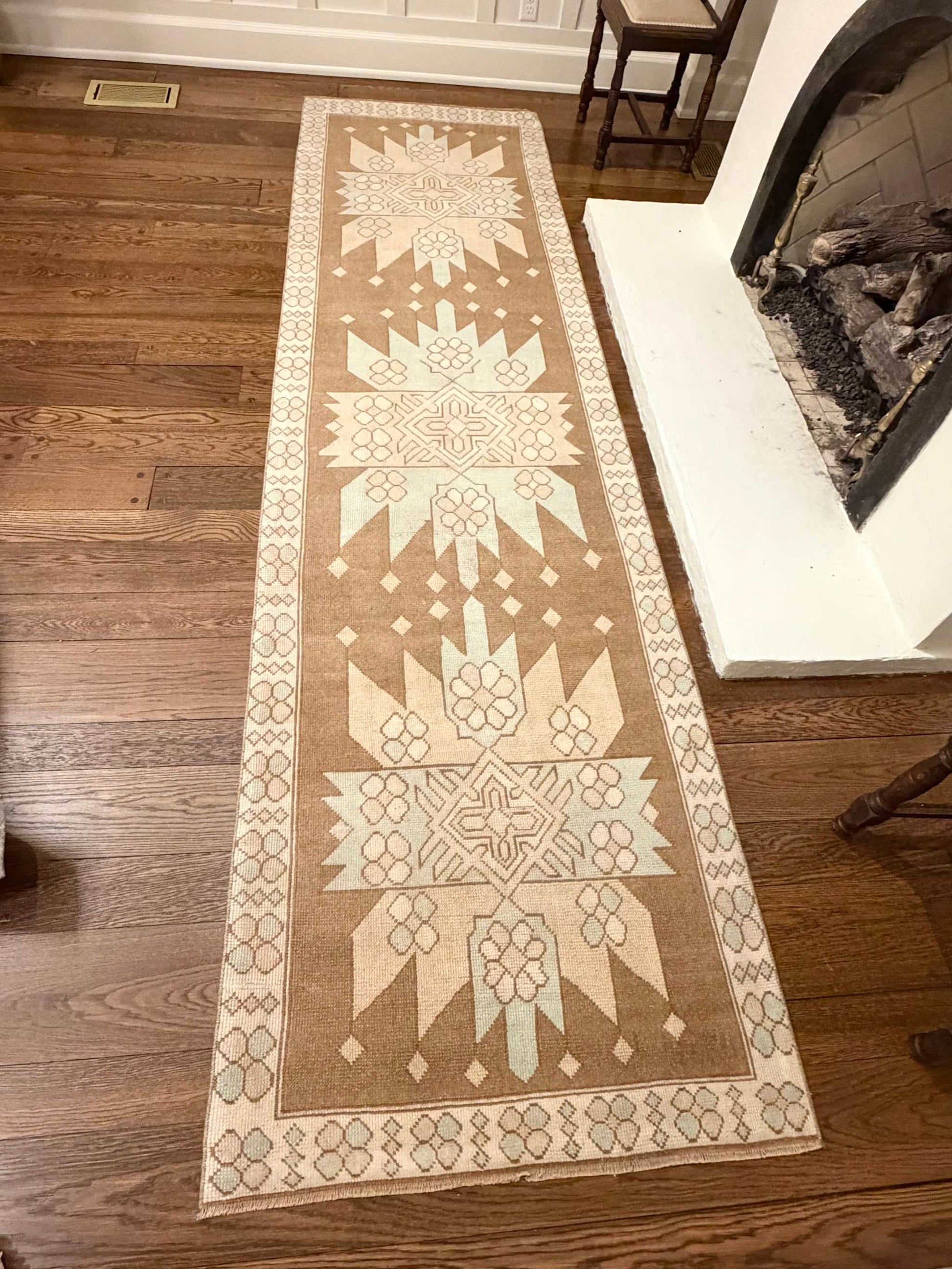 3’4”x12’5” vintage Turkish runner rug in beige, brown, blue, and cream colors