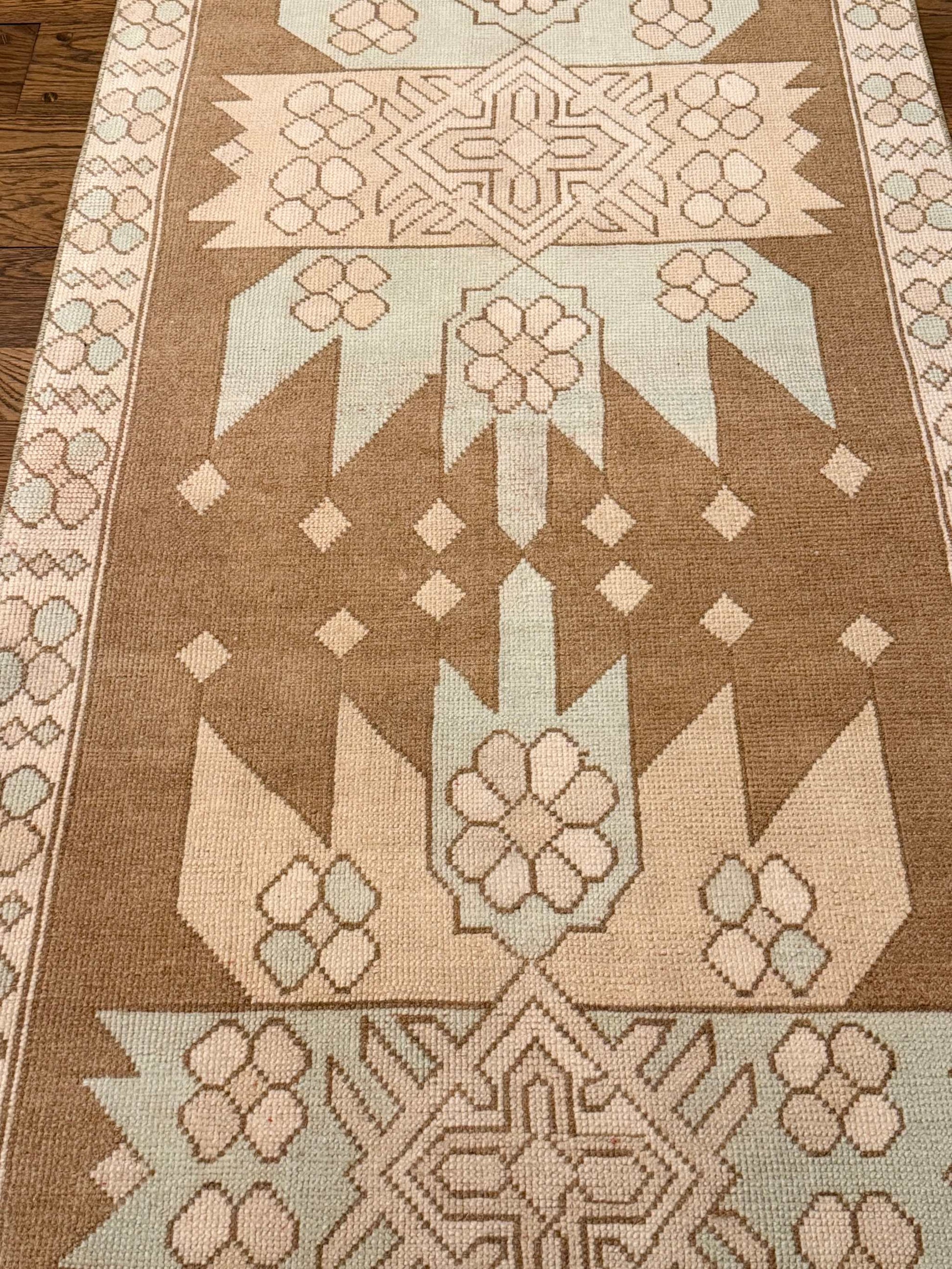 3’4”x12’5” vintage Turkish runner with beige, brown, blue, and cream colors