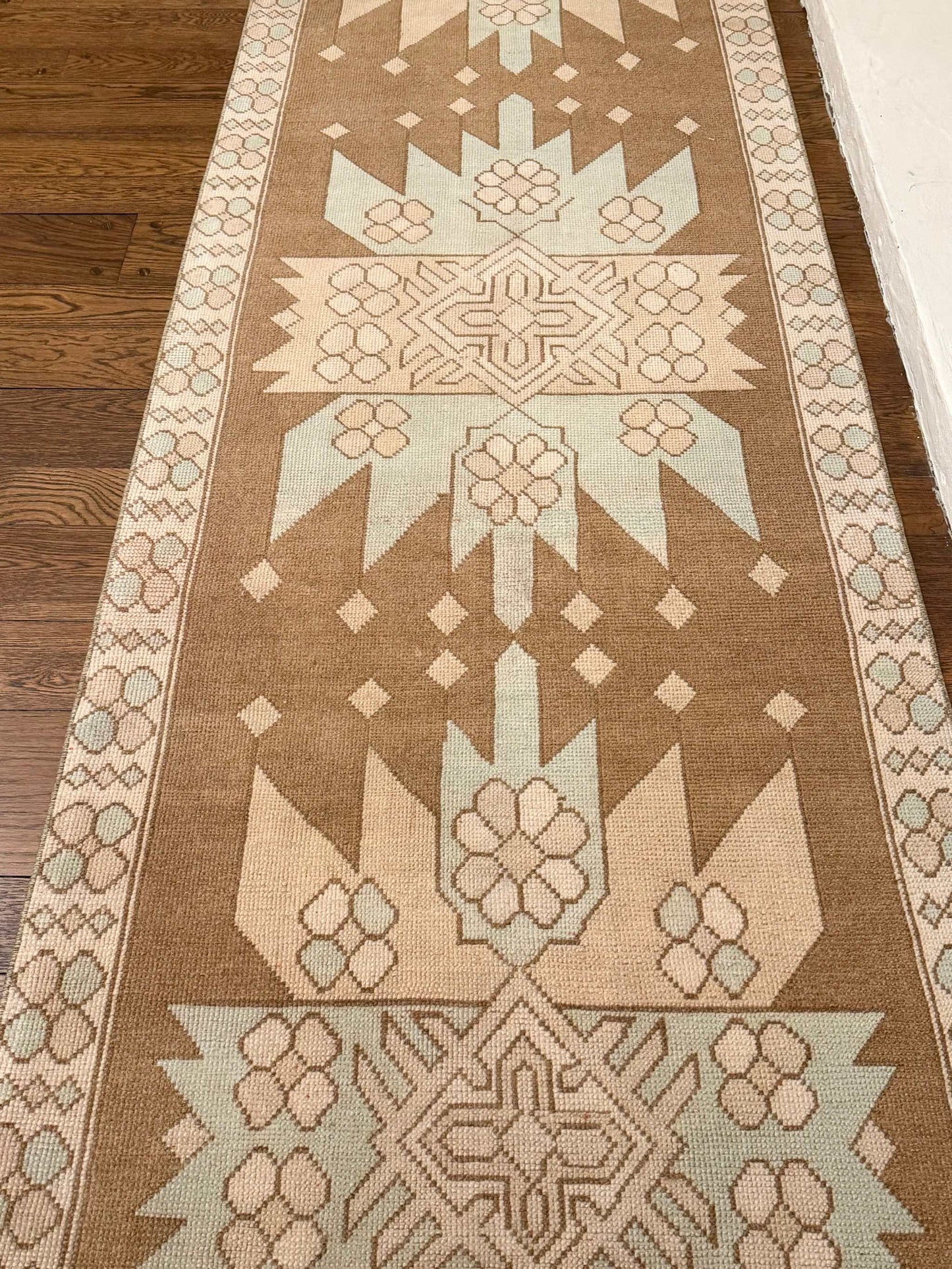 3’4”x12’5” vintage Turkish runner rug in beige, brown, blue, and cream colors