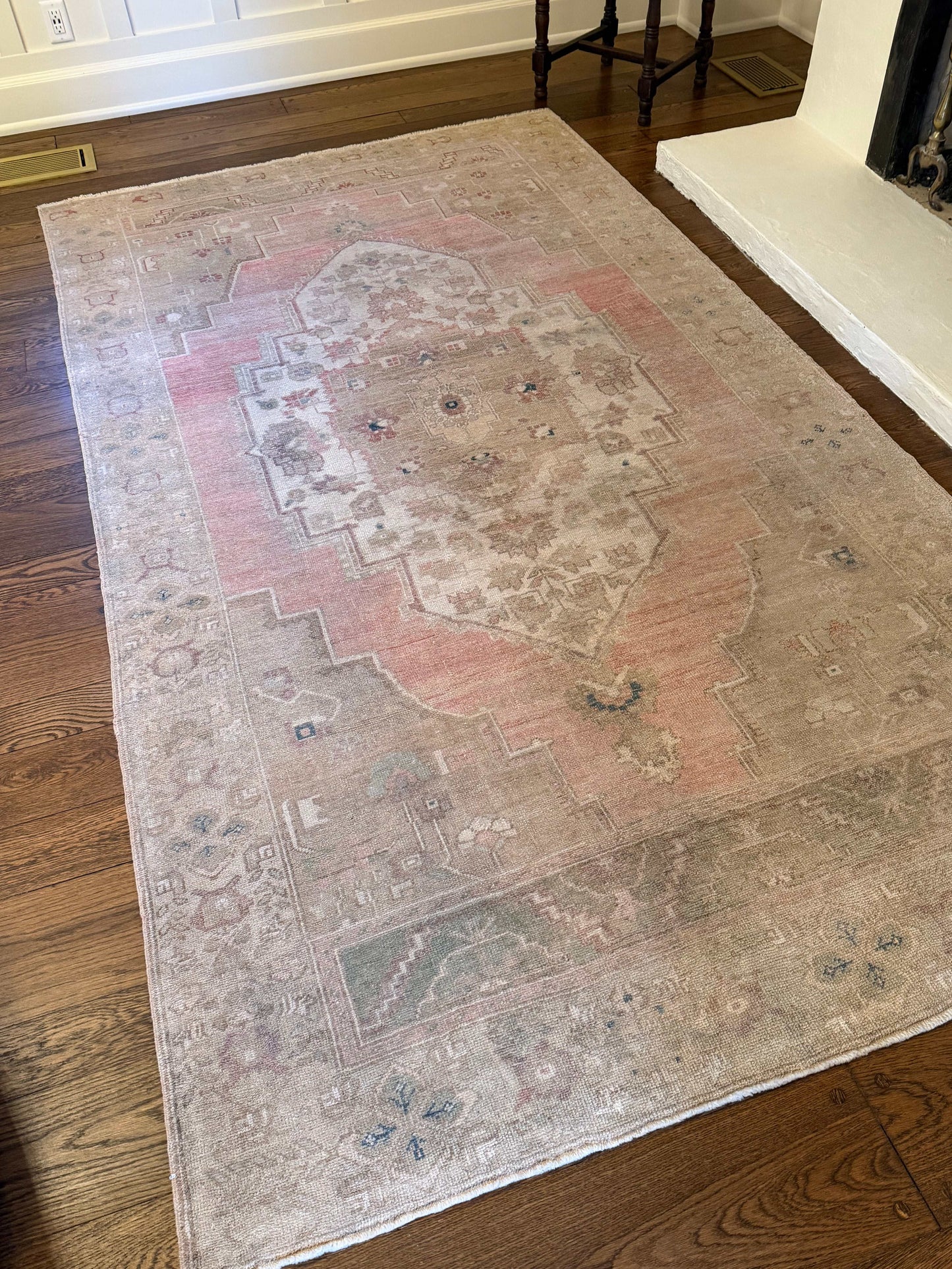 large area rug with brown and pink