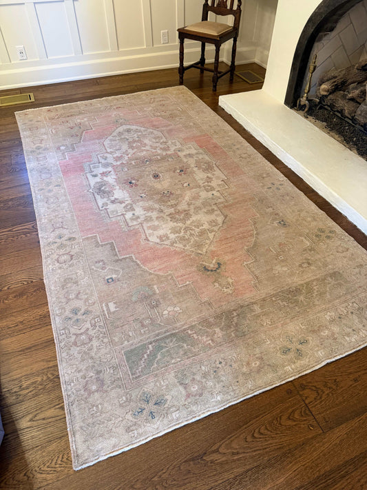 large area rug with brown and pink