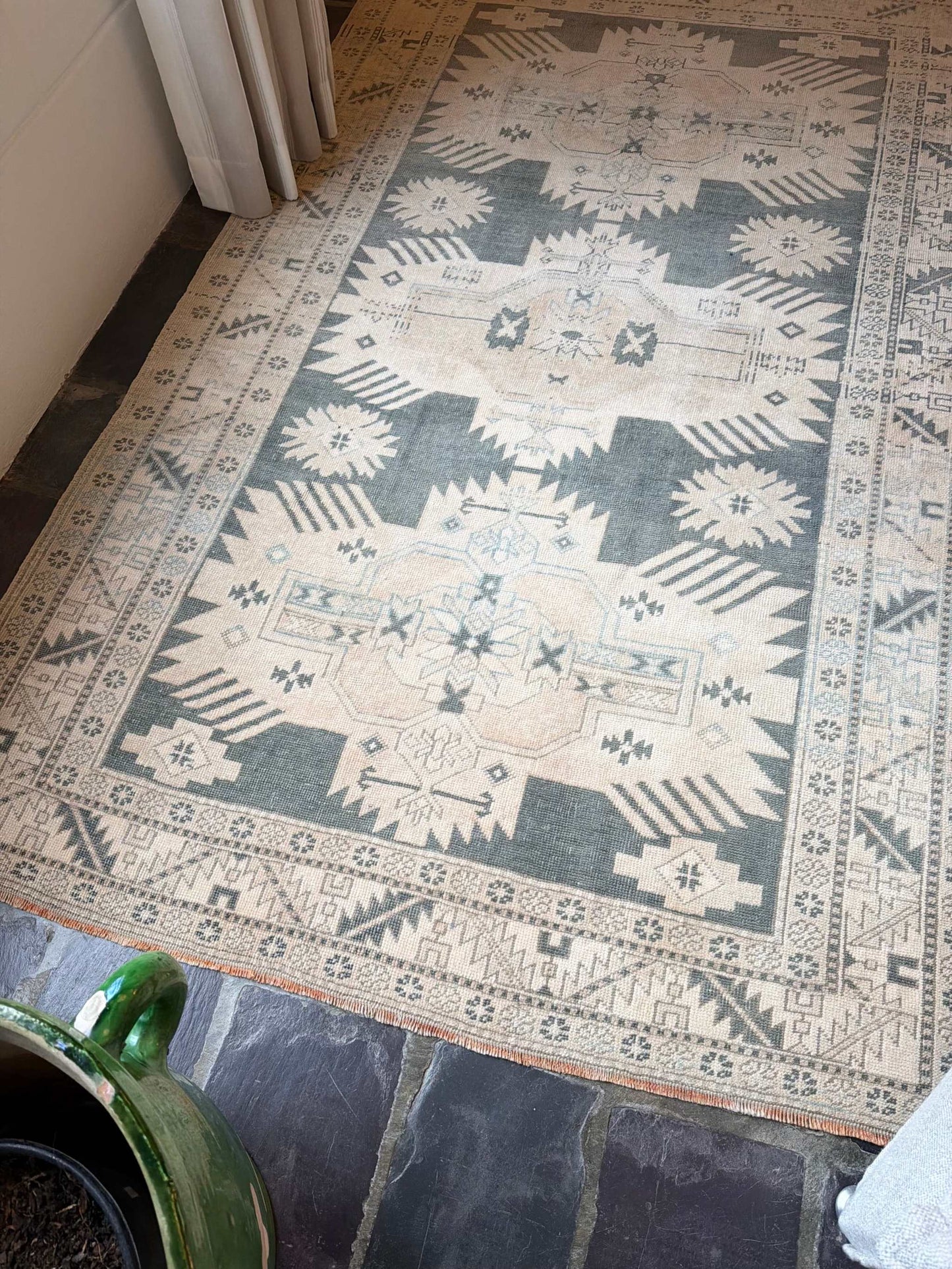 4’7”x7’4” gorgeous vintage Oushak area rug with soft green and light beige colors
