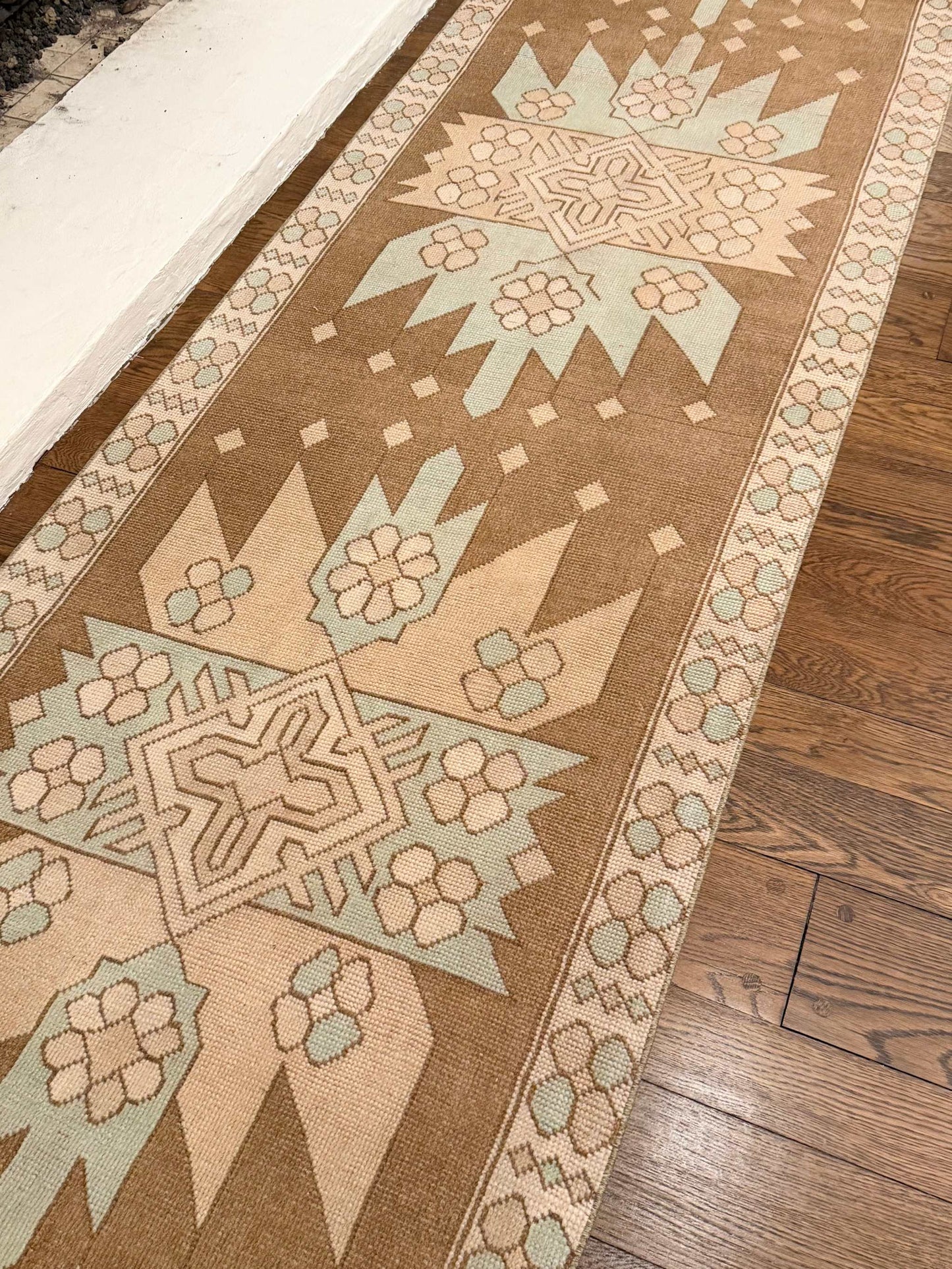 3’4”x12’5” vintage Turkish runner rug in beige, brown, blue, and cream colors