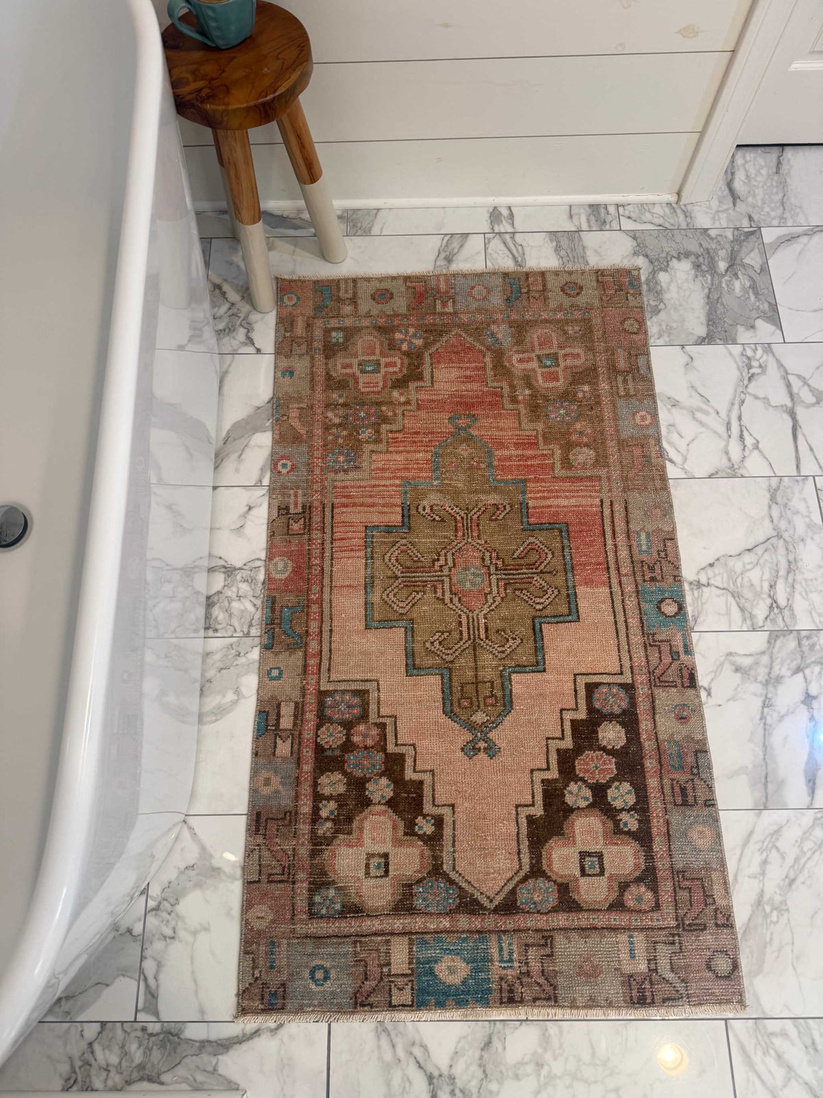 Vintage Rug with hand-knotted wool, faded terracotta field, olive-brown medallion and turquoise accents
