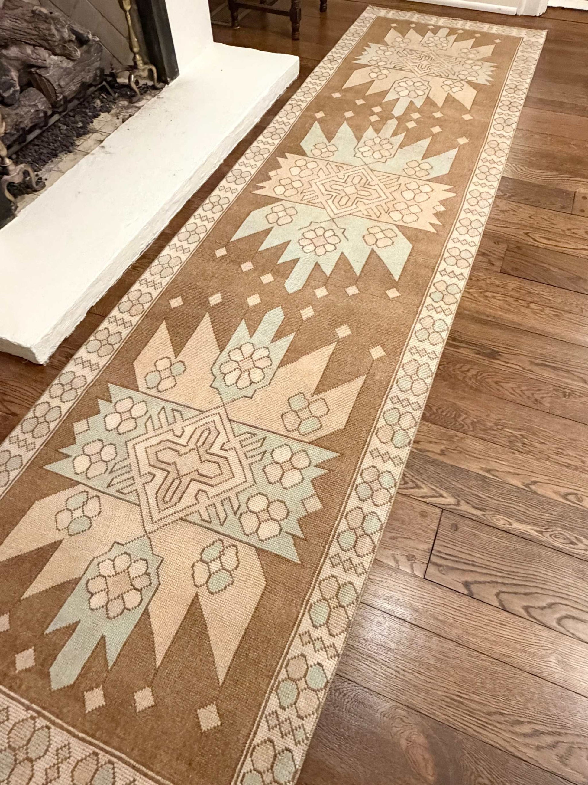 3’4”x12’5” vintage Turkish runner with beige, brown, blue, and cream colors