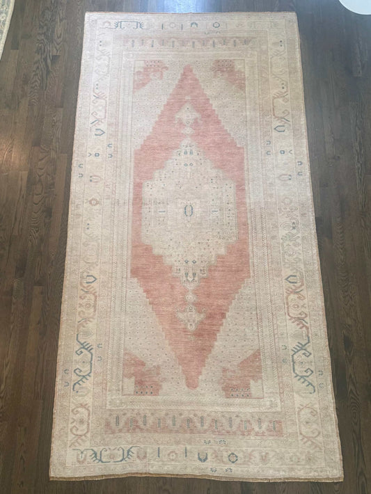 4’10” x 9’6” Area Rug
