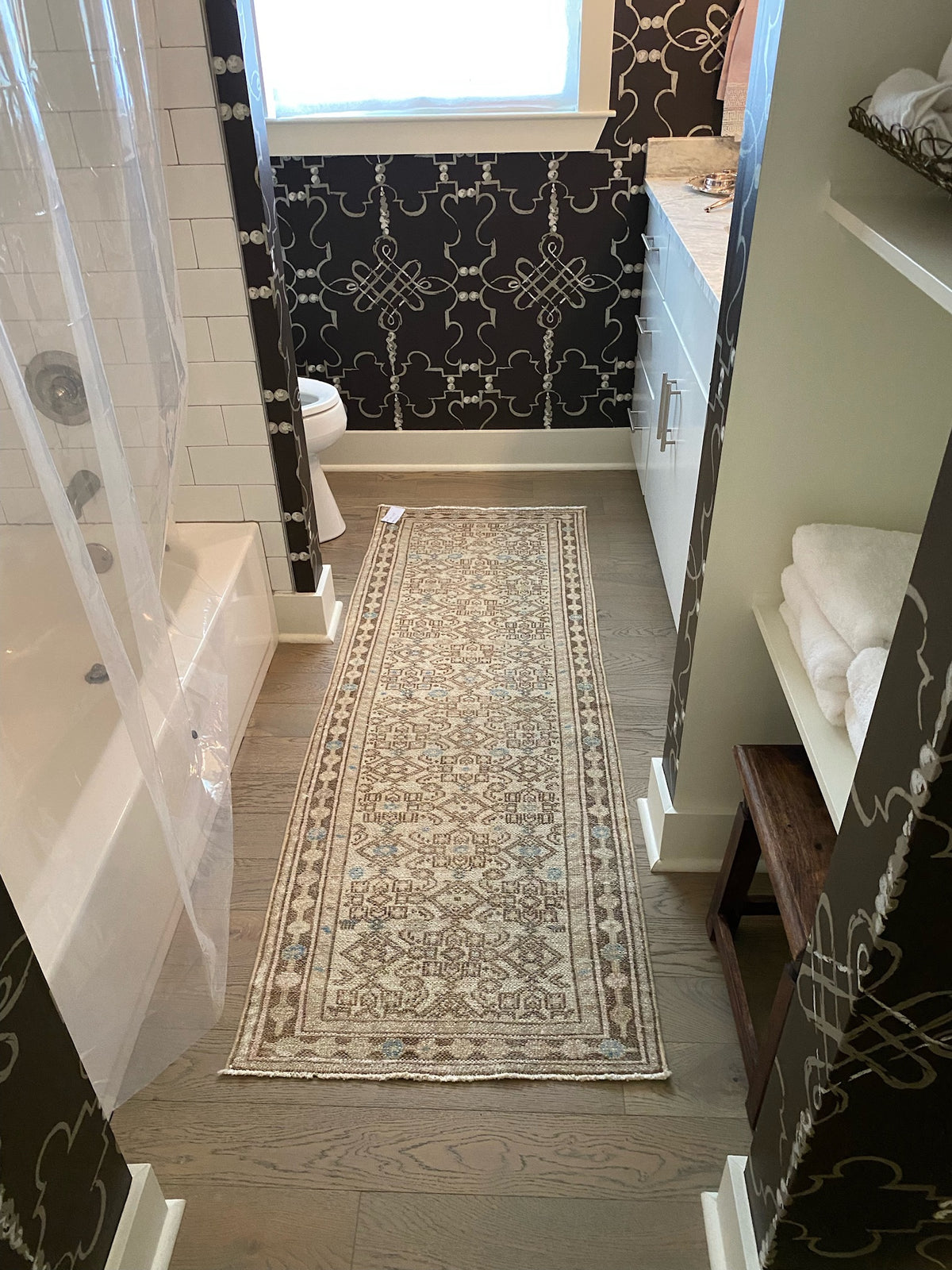 neutral rug runner in a bathroom