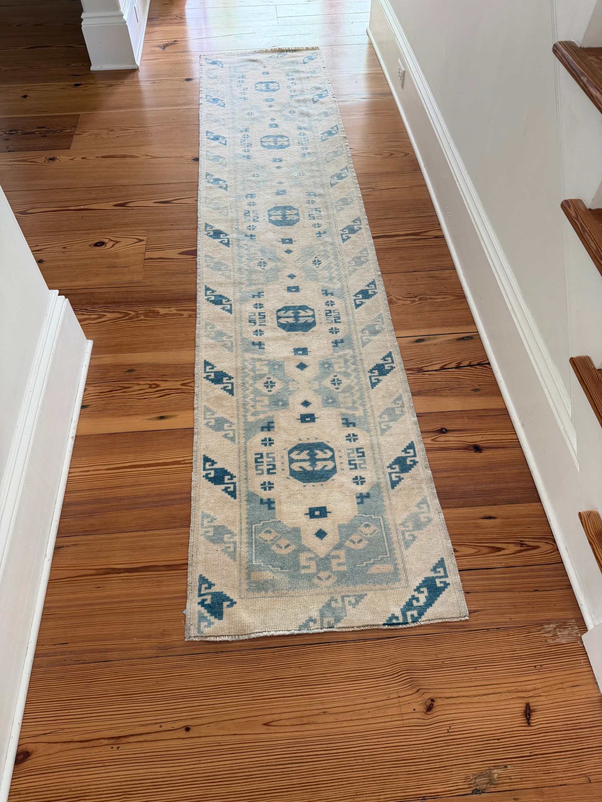 2' x 9'3" narrow hand-knotted vintage runner with rich blues and creamy ivory tones for hallways and entryways
