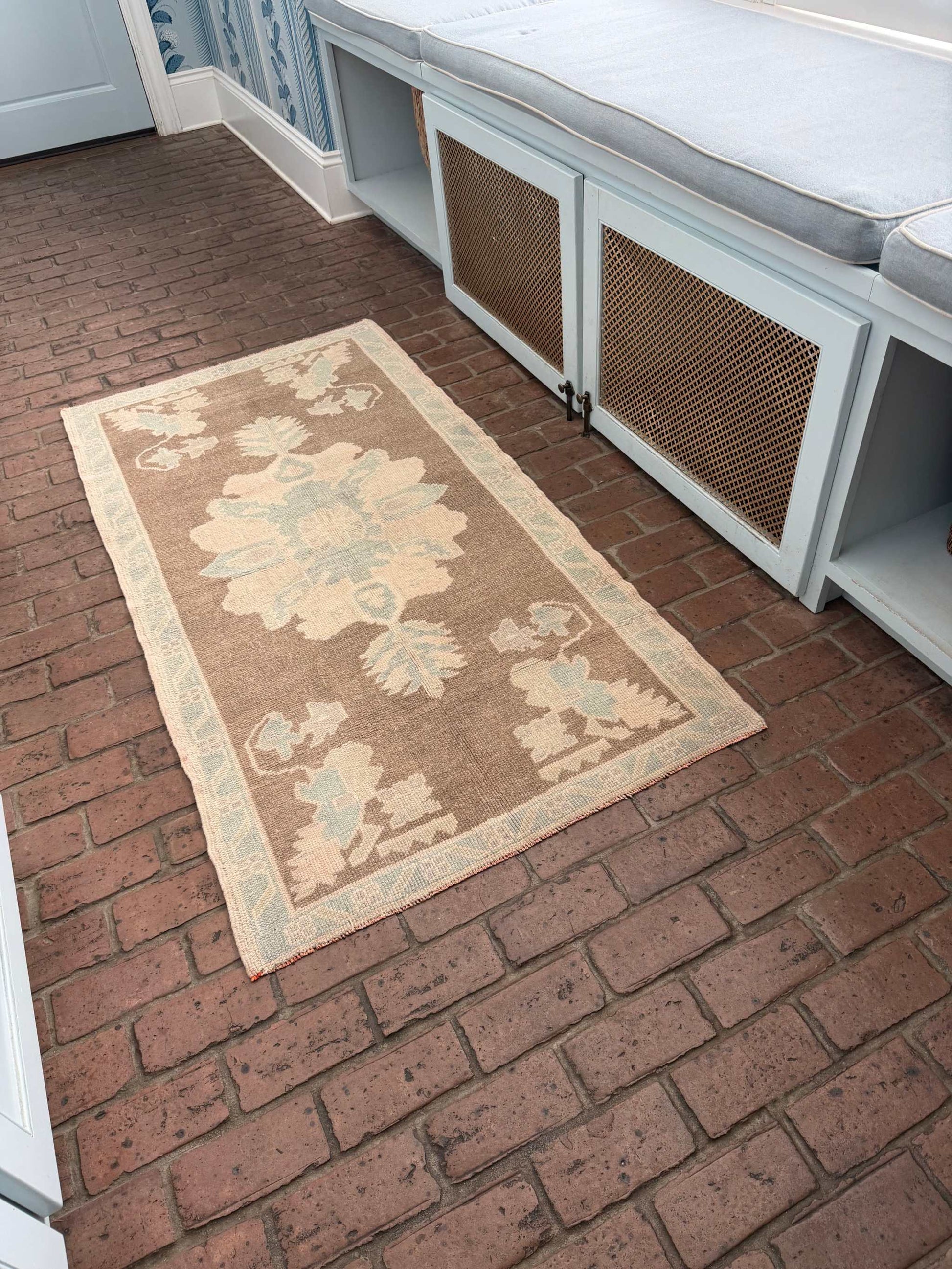 3'1" x 6'1" hand knotted runner rug with brown background and taupe blue designs