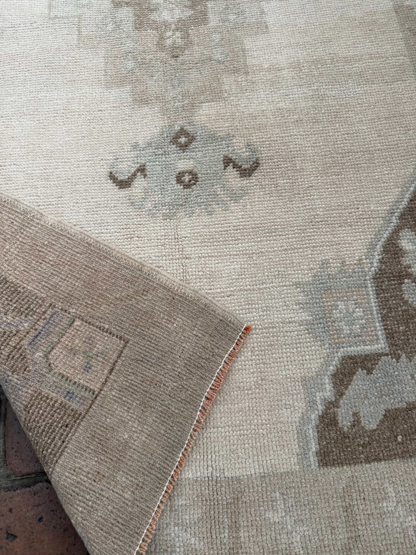 Hand knotted Turkish rug 2'11" x 6'5" with taupe, brown, and blue center medallion design