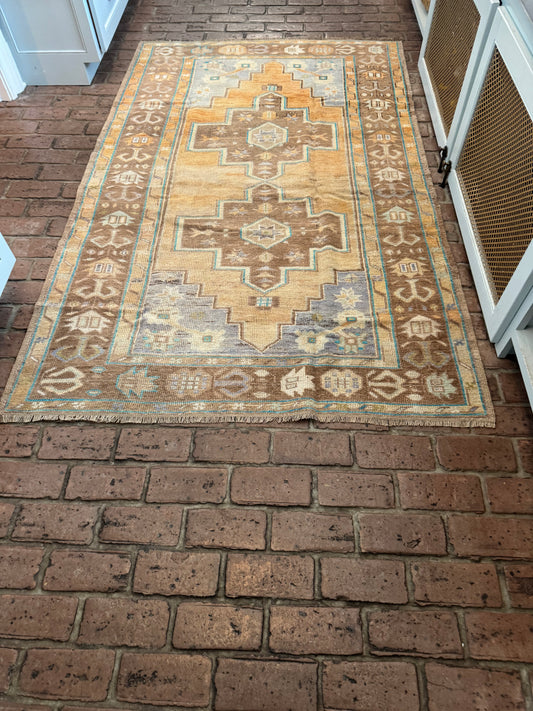 4'4" x 7'1" Area Rug with Orange and Brown