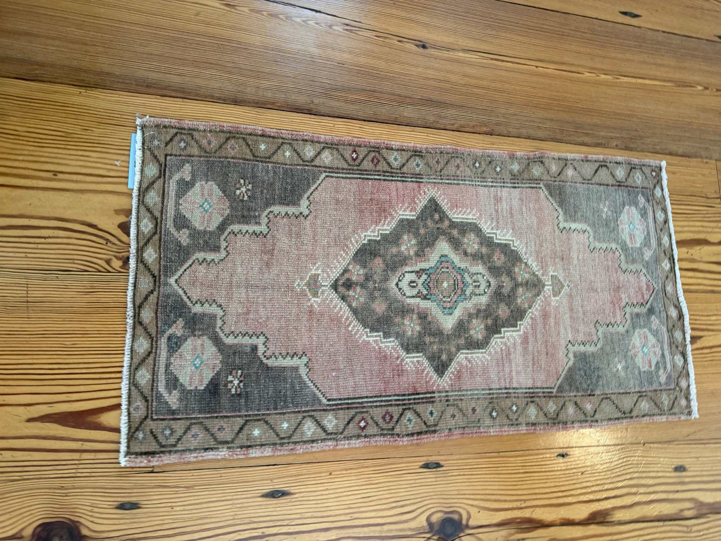 Small 1'9" x 3'4" vintage Turkish Mat with brick red and brown hand-knotted wool design