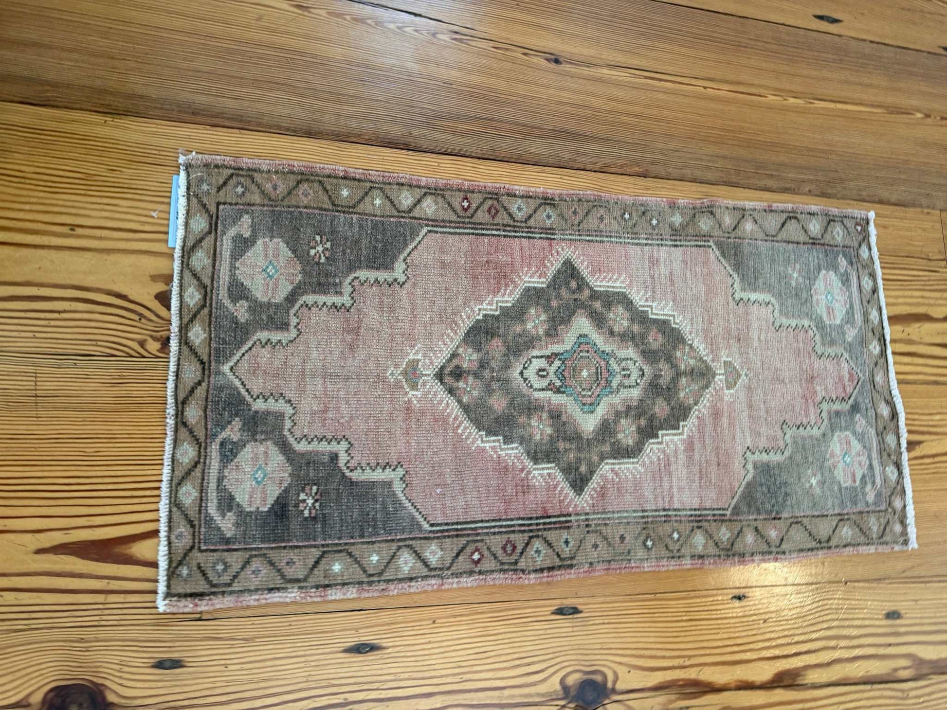 Small 1'9" x 3'4" vintage Turkish Mat with brick red and brown hand-knotted wool design