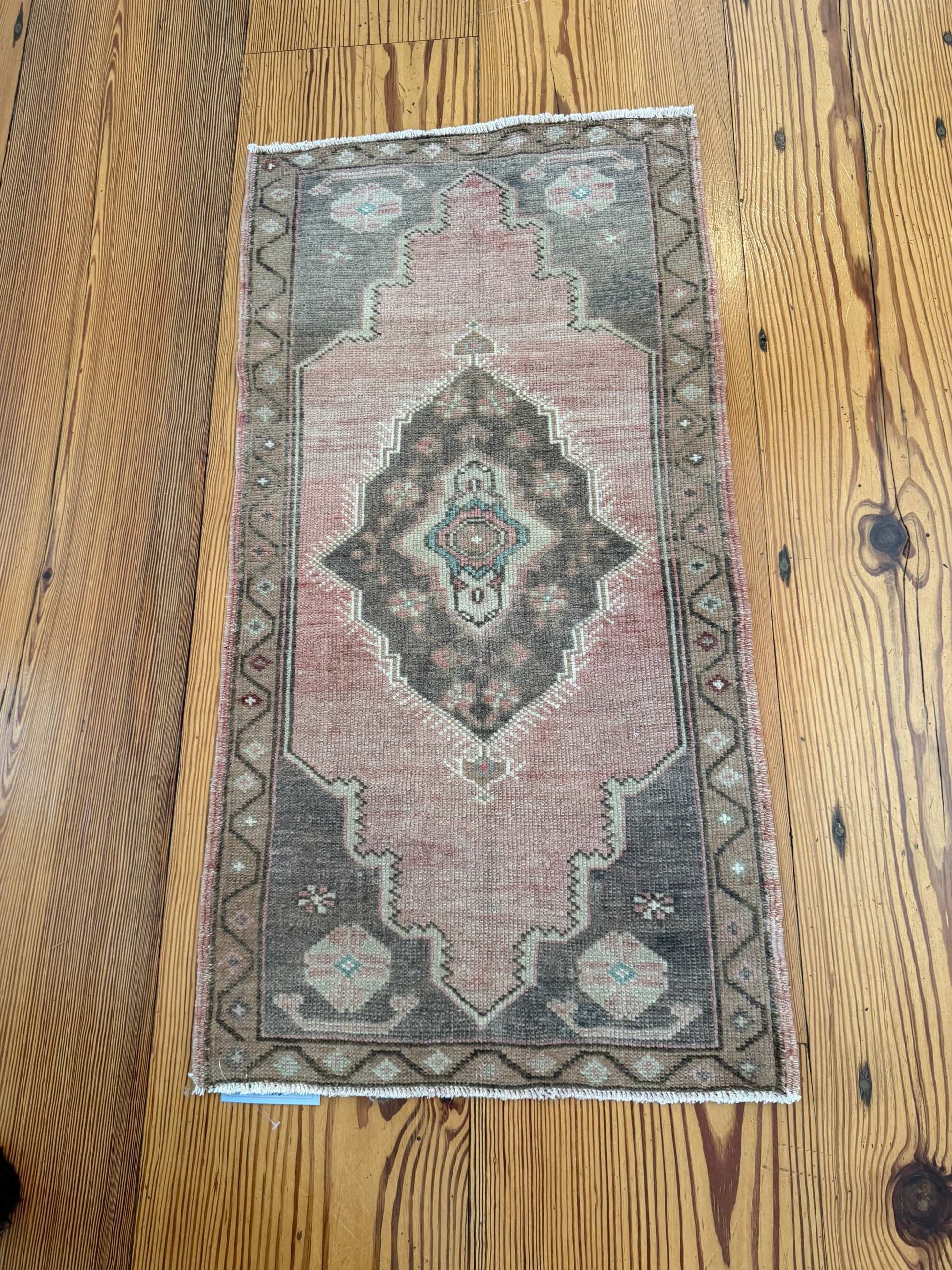 Small 1'9" x 3'4" vintage Turkish mat with brick red and brown hand-knotted wool design