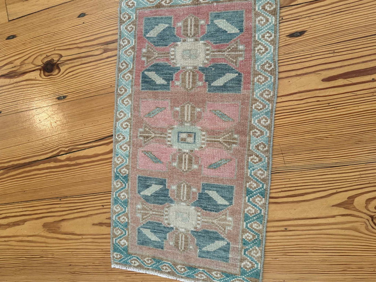Small vintage Turkish Mat 1'5.5" x 2'8" hand-knotted wool with blues, pink, and red-brown colors