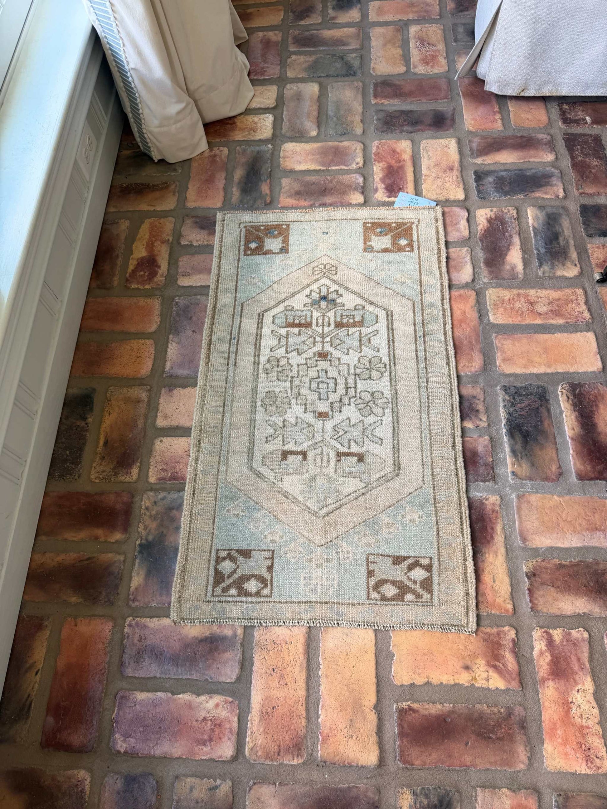Small vintage hand-knotted wool Oushak rug in pale blue, beige, and brown tones