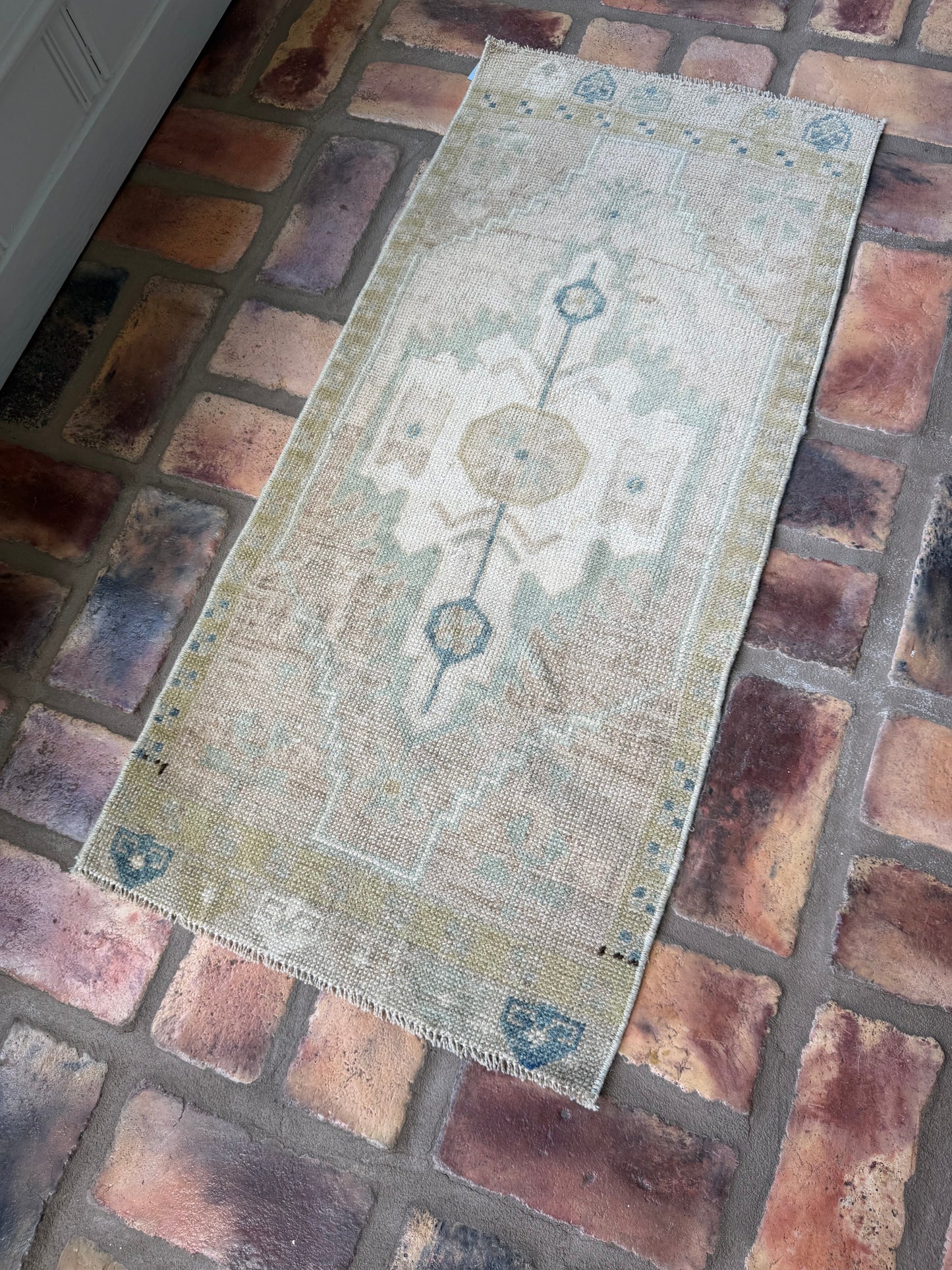 Small Oushak Rug in green and tan, hand-knotted wool vintage design