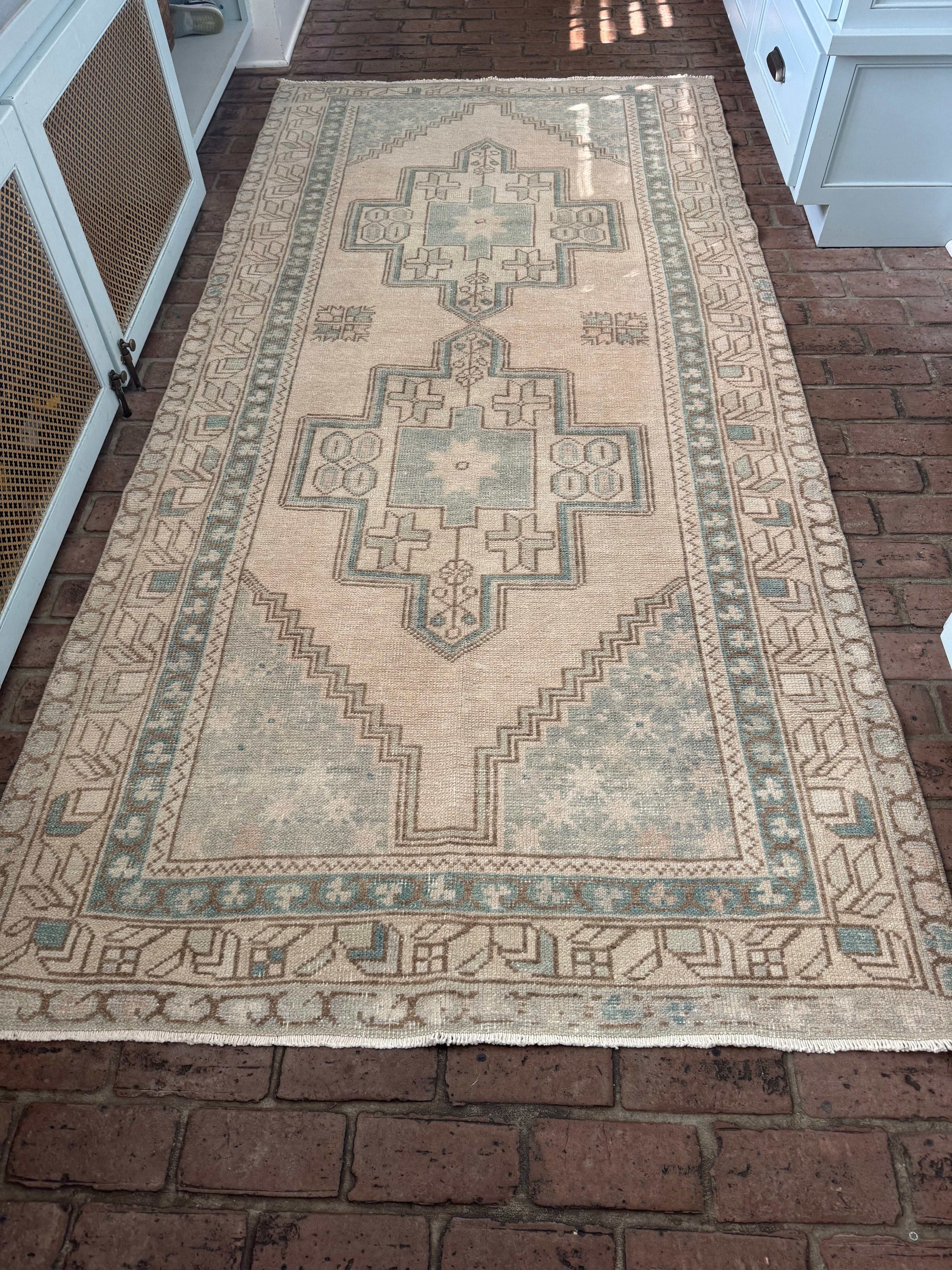 Vintage area rug with double center medallions, in pale blue-aqua and beige, 4'4" x 9'.